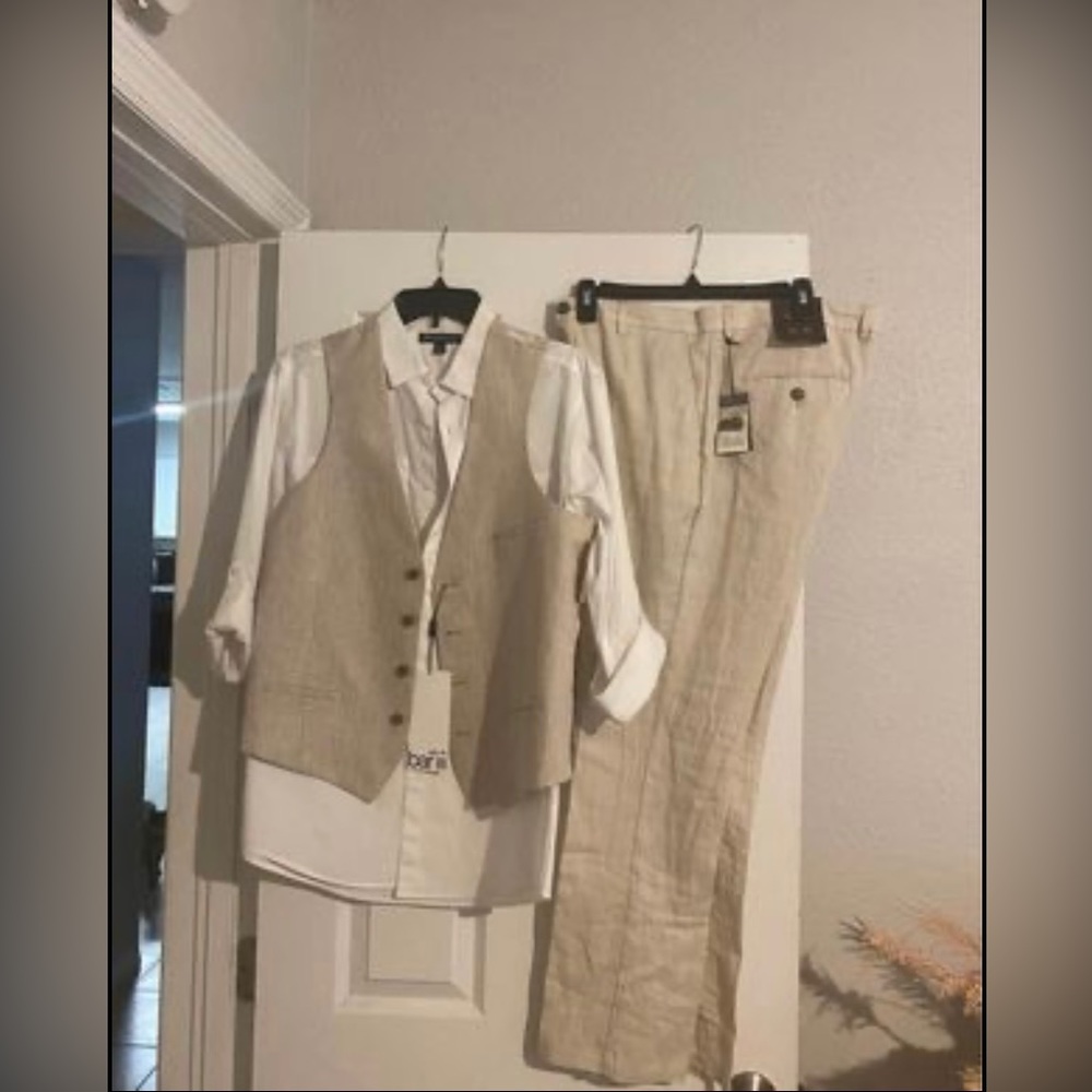 Men’s linen suite from Macy’s. Shirt/vest size small. Pants size 32-30